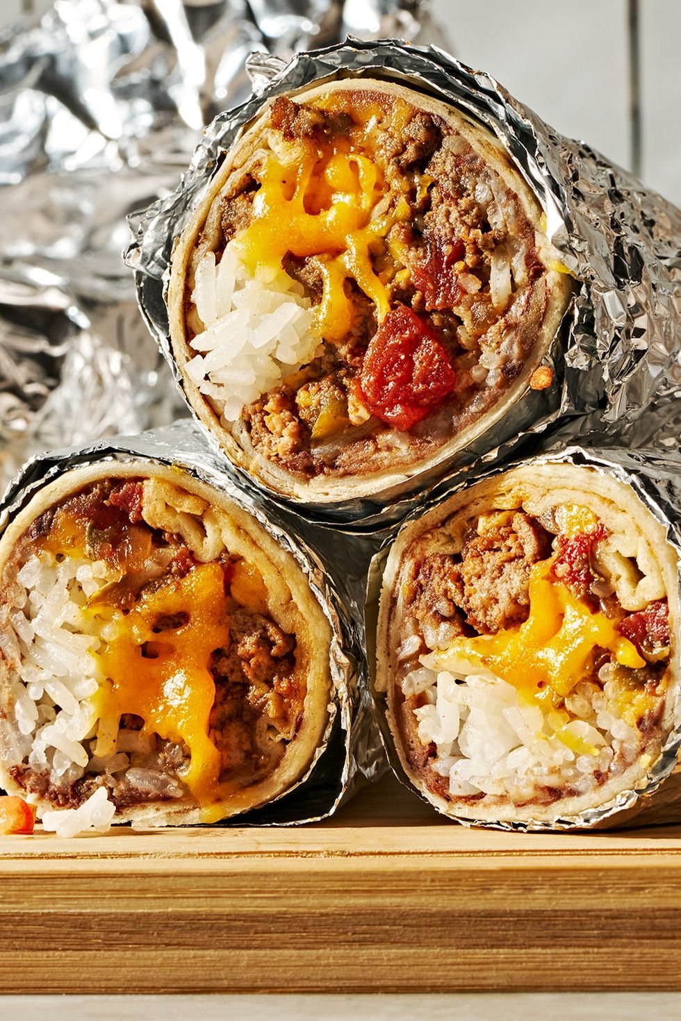 Burritos wrapped up in foil.