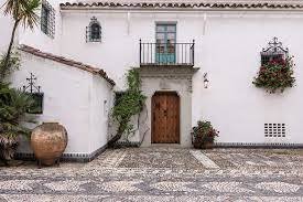 Front door of a Spanish Revival home.