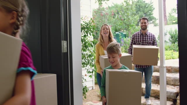Family moving in boxes