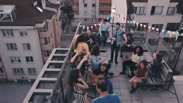 Neighbors gathering on a rooftop