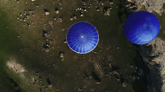 Two weather balloons above Earth