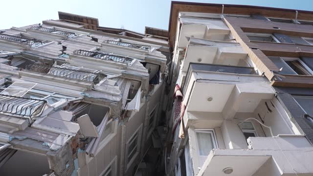 Earthquake destruction of two buildings