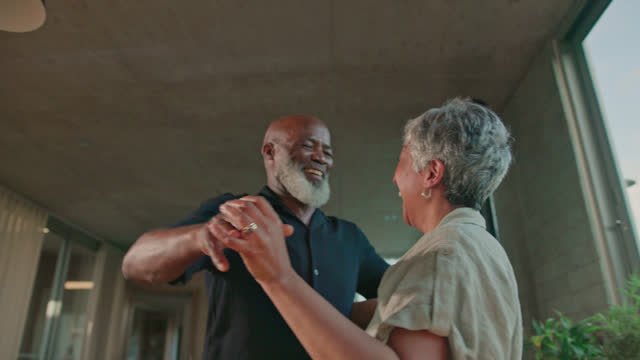 An older couple dancing together 